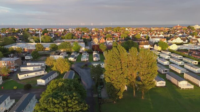 Aerial view of a large caravan park at golden hour