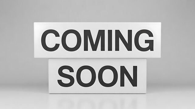 Coming soon message displayed on white blocks against a gray background