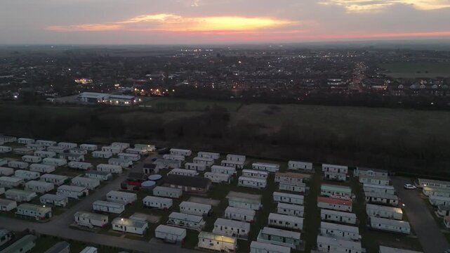 Aerial view of a mobile home park at twilight