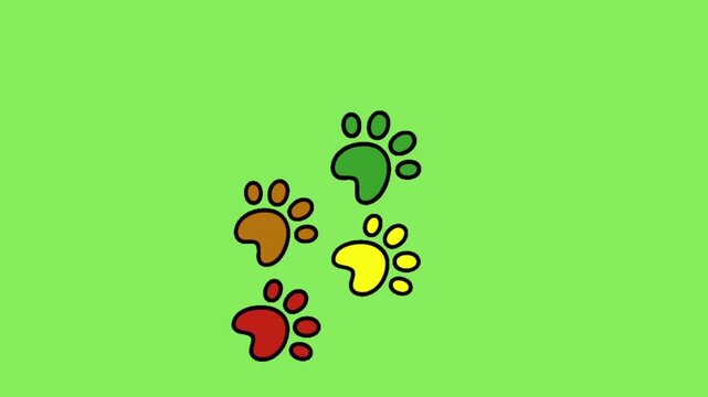 Colorful dog paw prints animation on green screen