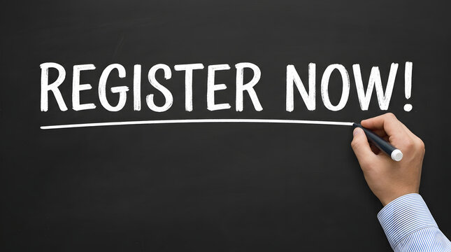 A human hand in a blue and white striped shirt sleeve holds a marker, writing the capital white text REGISTER NOW! with a straight horizontal underline across a dark blackboard surface background