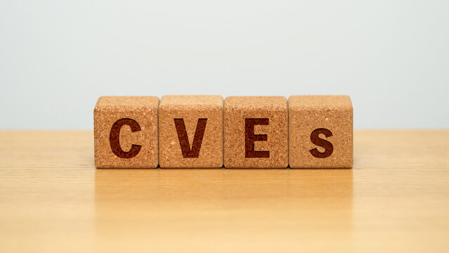 CVEs on four cork wooden blocks - common vulnerabilities and exposures concept