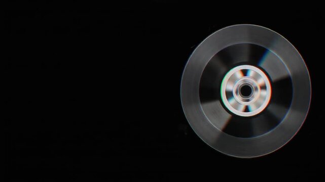 Abstract Glitch Effect on Spinning CD Disc with Rainbow Colors and Digital Distortion