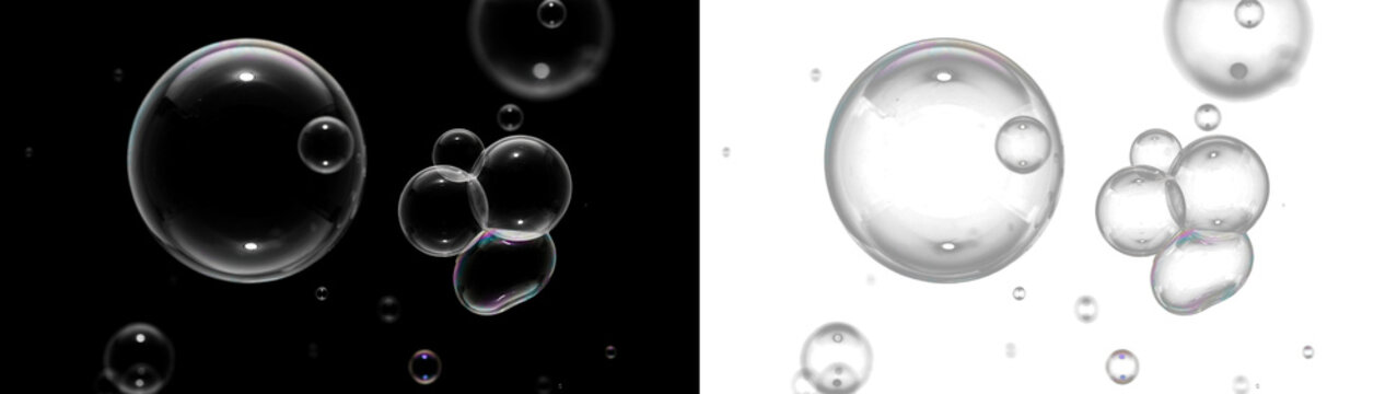 Soap bubbles of different sizes floating in the air, isolated on transparent background