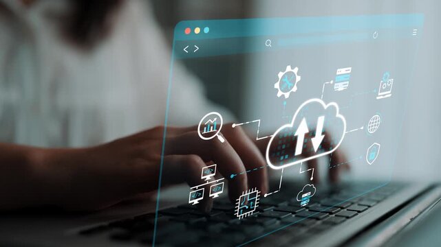 Close-Up View of Hands Typing on Laptop with Digital Cloud Technology Icons on Screen Depicting Data Upload and Download Concepts. Entropy.