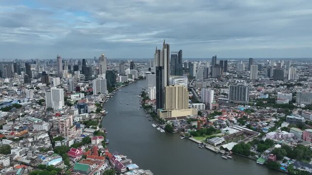 Aerial view of the city skyline over the Chao Phraya River, Bangkok, Thailand