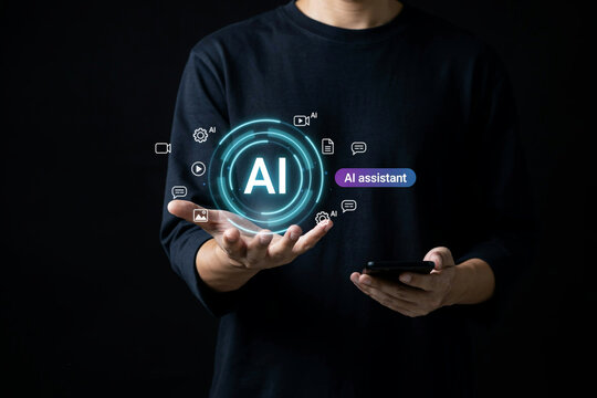 Person holding smartphone with AI assistant icon and related technology symbols for artificial intelligence chatbot.