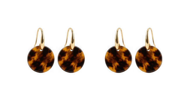 Pair of elegant gold earrings with round tortoiseshell pendants isolated on transparent background