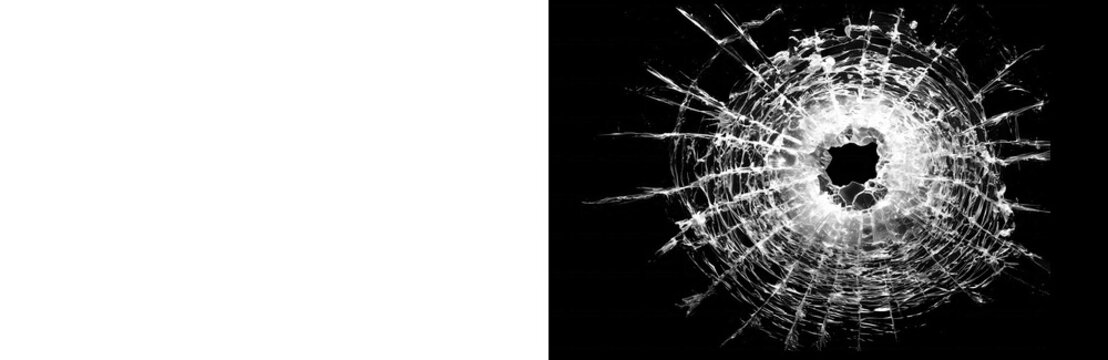 Shattered glass hole with dramatic radial cracks spreading outward across dark surface isolated on transparent background
