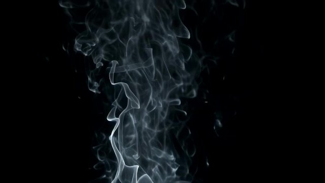 Smoke Rising on Black Background.