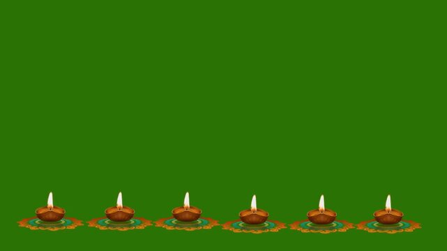 Traditional row of burning diya oil lamps glowing at the bottom isolated on green screen chroma key