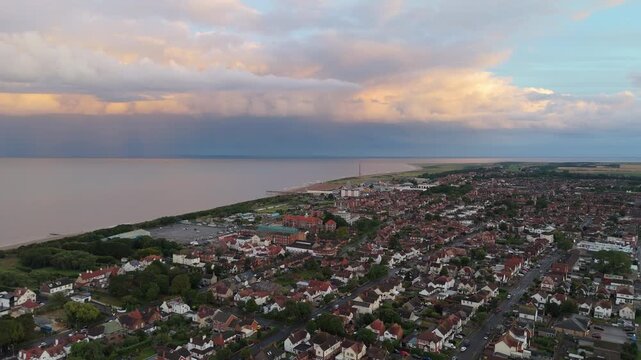 Aerial view shows coastal town at twilight