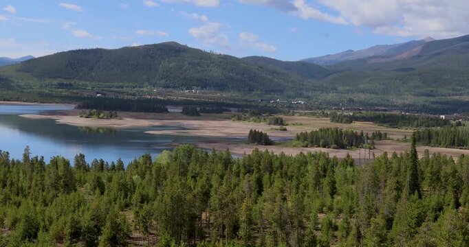 Pan left video of Dillon Reservoir Colorado. This shows an overview of the Dillon Reservoir with extremely low water levels.