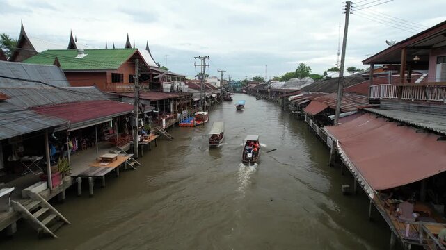 Aerial night view of Amphawa Floating Market scenery, Thailand