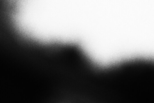 Abstract black and white gradient background with soft grainy texture