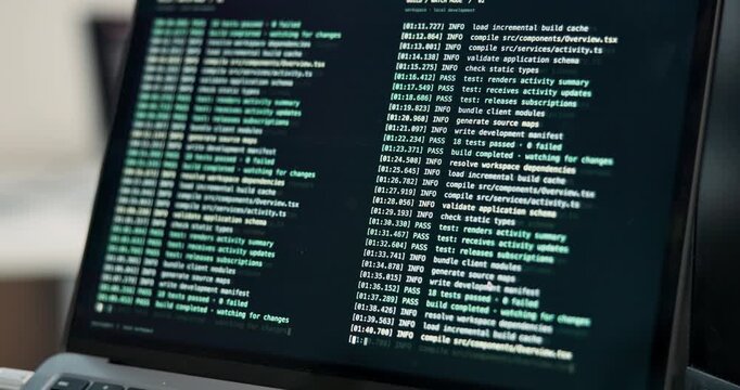 Laptop, screen and code in office for programming, command and system analysis for cybersecurity. Display, tech and coding in workplace with python script, testing database and debugging of software