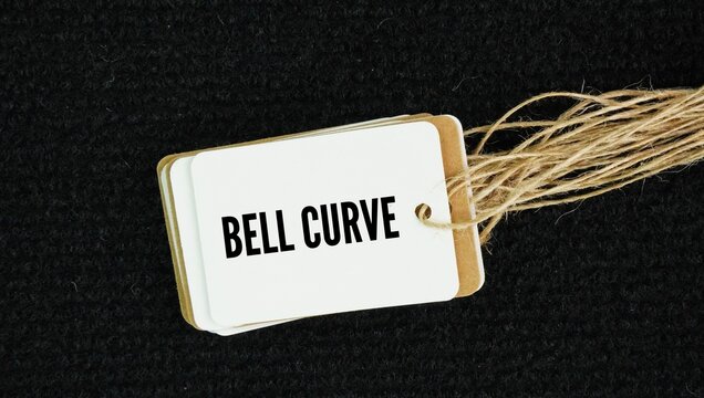 Tag paper with the word bell curve is a graph that shows how data is spread out, with most values ​​grouping around the average and fewer values ​​falling at the extreme ends.