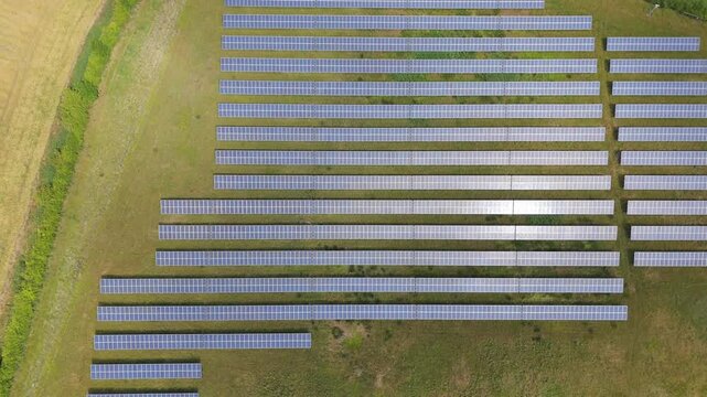 Aerial view of solar panels in open fields