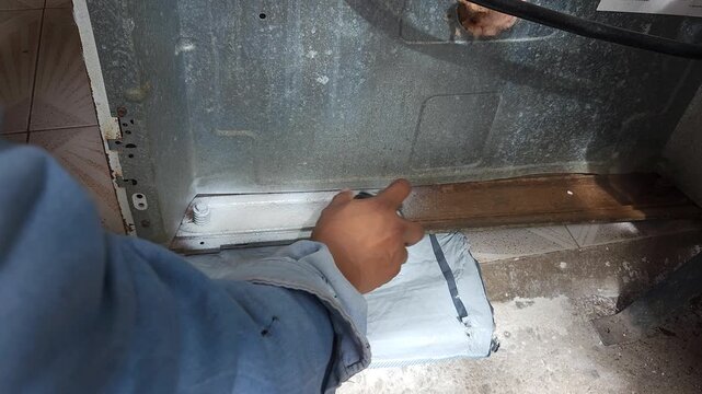 Painting Rusted Stove Base With White Anti Rust Paint