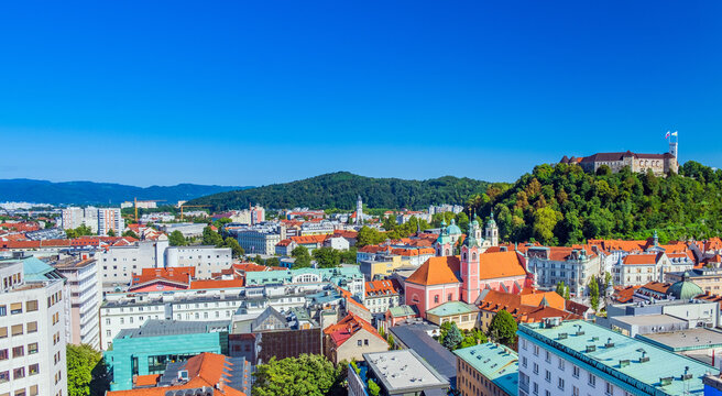 Panorama of city of Ljubljana, city center, Franciscan church and Ljubljanski Grad in background. Capital of Slovenia