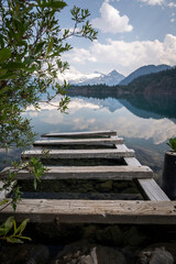 Fototapeta premium Beautiful view to old wooden dock in Garibaldi Lake, Squamish