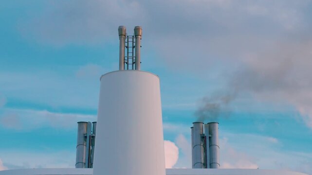 Exhaust Funnels and Smokestacks Releasing Air Pollution on Cruise Liner Superstructure