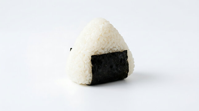 Traditional japanese triangular rice ball wrapped in nori seaweed isolated on white background with japanese food asian cuisine cooked rice fast food photography triangle