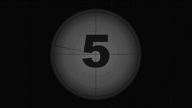 Countdown numbers in glowing spheres with cinematic motion during a dark sequence