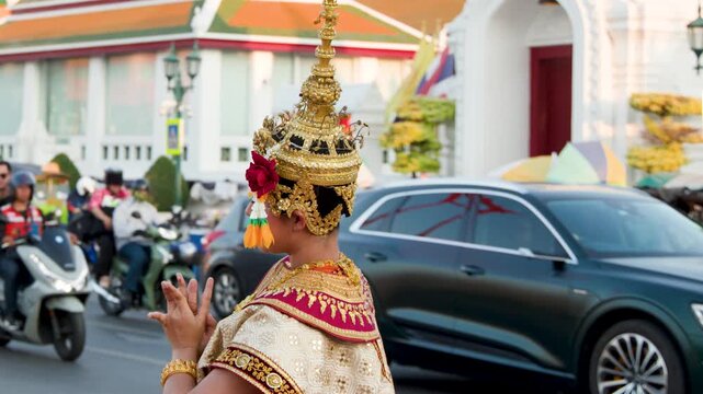 Traditional Thai Khon Dancer Performs Near Wat Suthat Temple in Bangkok