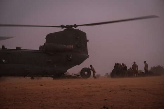 Loading going on at the rear ramp of a transport helicopter in the Sahel near Tin-Akoff, Burkina Faso