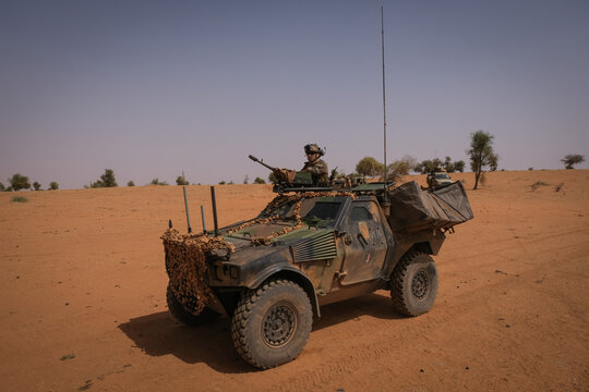 French light armoured car climbing a sandy slope in the Sahel near Tin-Akoff, Burkina Faso