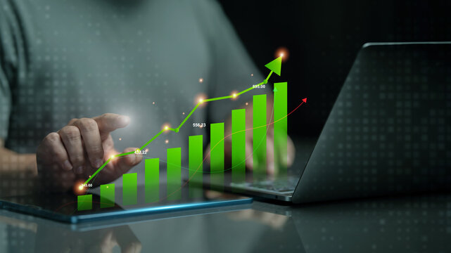 ESG, environment social governance investment business concept.   A hand uses digital pen on tablet with charts for sustainability, green investment, sustainability, energy, renewable, eco. Co2. CSR.