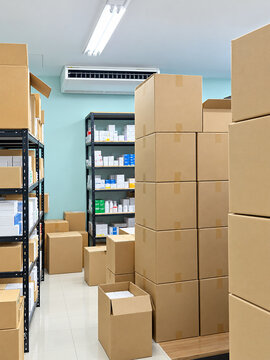 Organized Medical Supply Stockroom with Cardboard Boxes and Shelving
