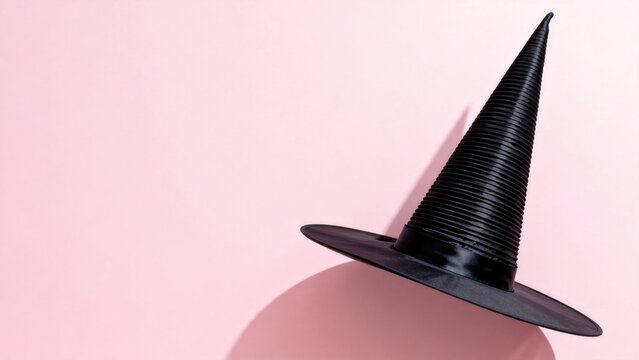 Isolated witch hat on white background with clipping path: Wizard's black pointy hat head wearing costume for Halloween character in seasonal autumn festival decorations