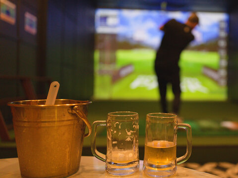 Beer Mugs and Ice Bucket at Indoor Golf Simulator