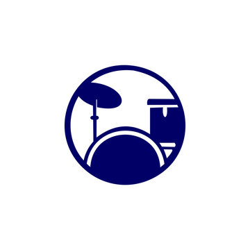 A deep blue vector icon or graphic logo depicting a drum kit enclosed within a circular badge frame. The clean, flat silhouette design makes it ideal for music bands, recording studios, drum lessons, 
