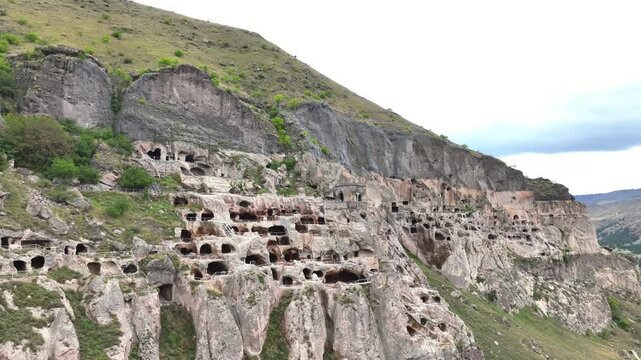 Ancient Vardzia cave monastery complex carved into the Erusheti mountain in southern Georgia, revealing its unique rock cut architecture and historical significance