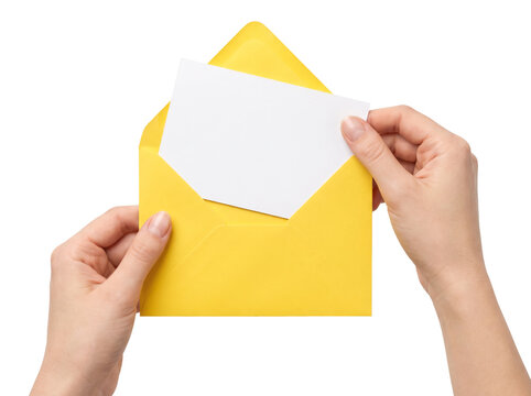 Hands holding an open yellow envelope and a blank white card