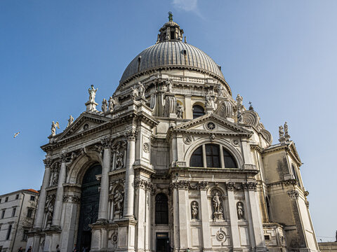 Basilica di Santa Maria della Salute with Magnificent Baroque Dome and Ornate Marble Facade in Venice, Italy
