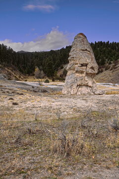 Liberty Cap at Mammoth Hot Springs, 11-m-tall (37 foot) mineral cone, remains of an extinct spring flowing there for long. Yellowstone NP-WY-USA-022