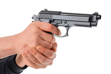 Fototapeta premium Gun violence and crime prevention, person holding a semi-automatic pistol with two hands for self defense or tactical training isolated