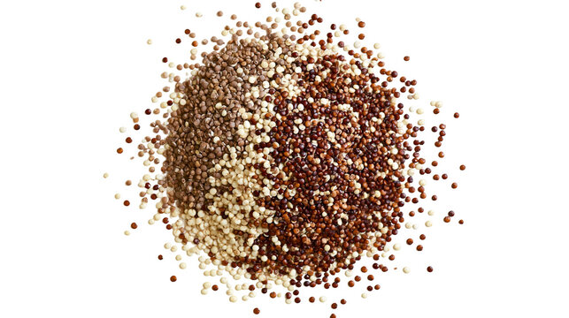 Isolated mixed quinoa seeds in a pile with scattered healthy grains for a balanced diet