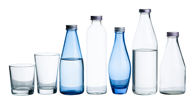 Isolated diverse collection of clear and blue glass bottles with drinking glasses filled with water