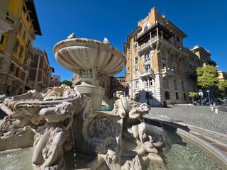 Ornate Baroque Fountain in Coppede District Piazza Mincio Rome © Izanbar photos