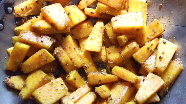 pumpkin saute on a pan with Indian spices