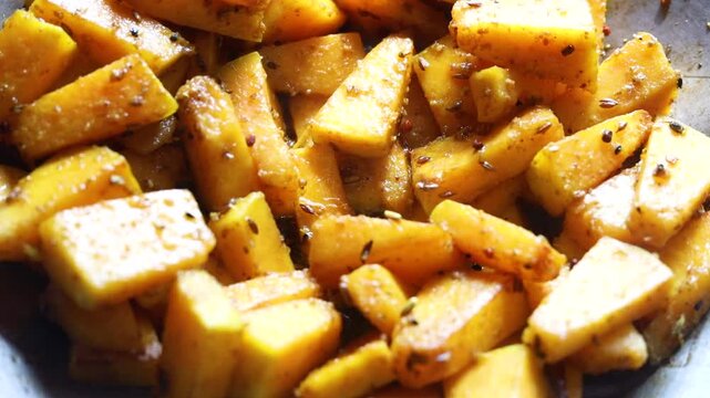 pumpkin saute on a pan with Indian spices