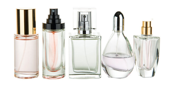 Isolated collection of elegant glass perfume and fragrance spray bottles for beauty product photography