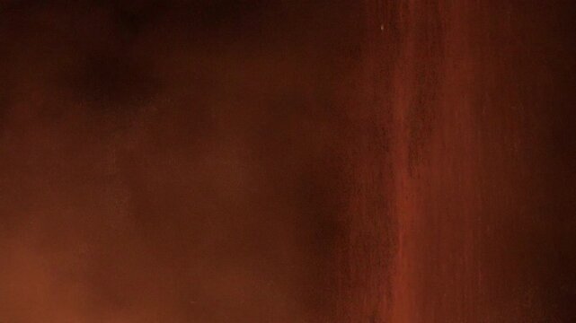 Simulated rocket engine exhaust shoots downward.