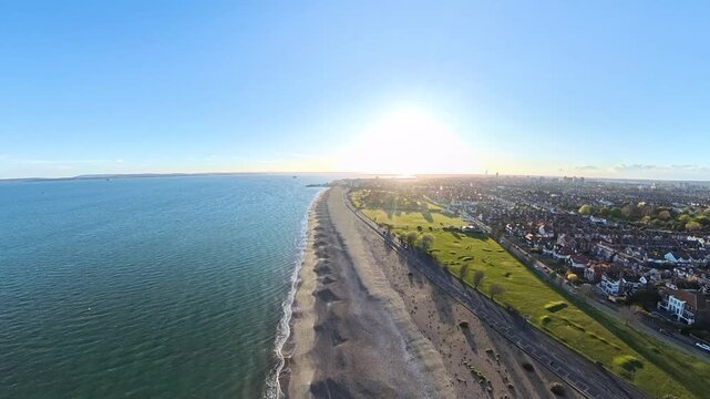Travel and History: Aerial Drone Shot of Sunny Southsea Seafront and Promenade Overlooking the Solent in Portsmouth, Hampshire