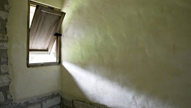 Rustic Interior Wall With Open Wooden Window and Sunlight